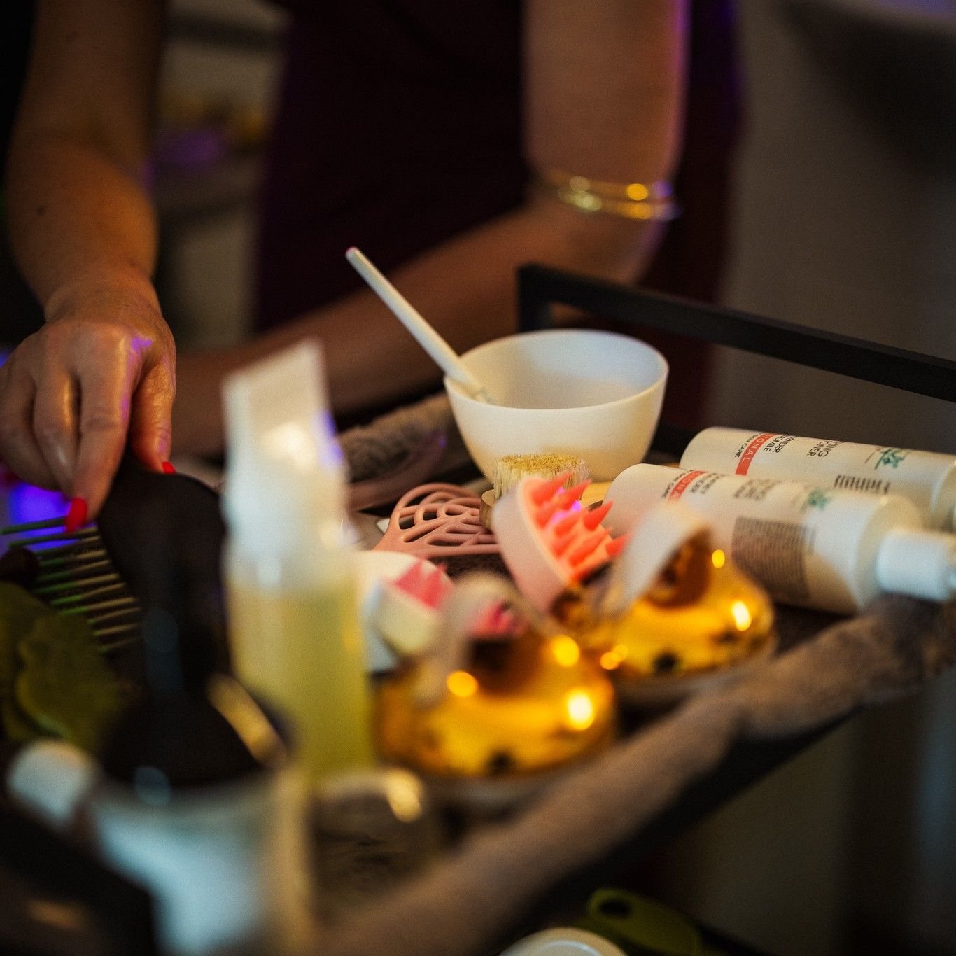 A mixing bowl and products set out on the treatment trolley