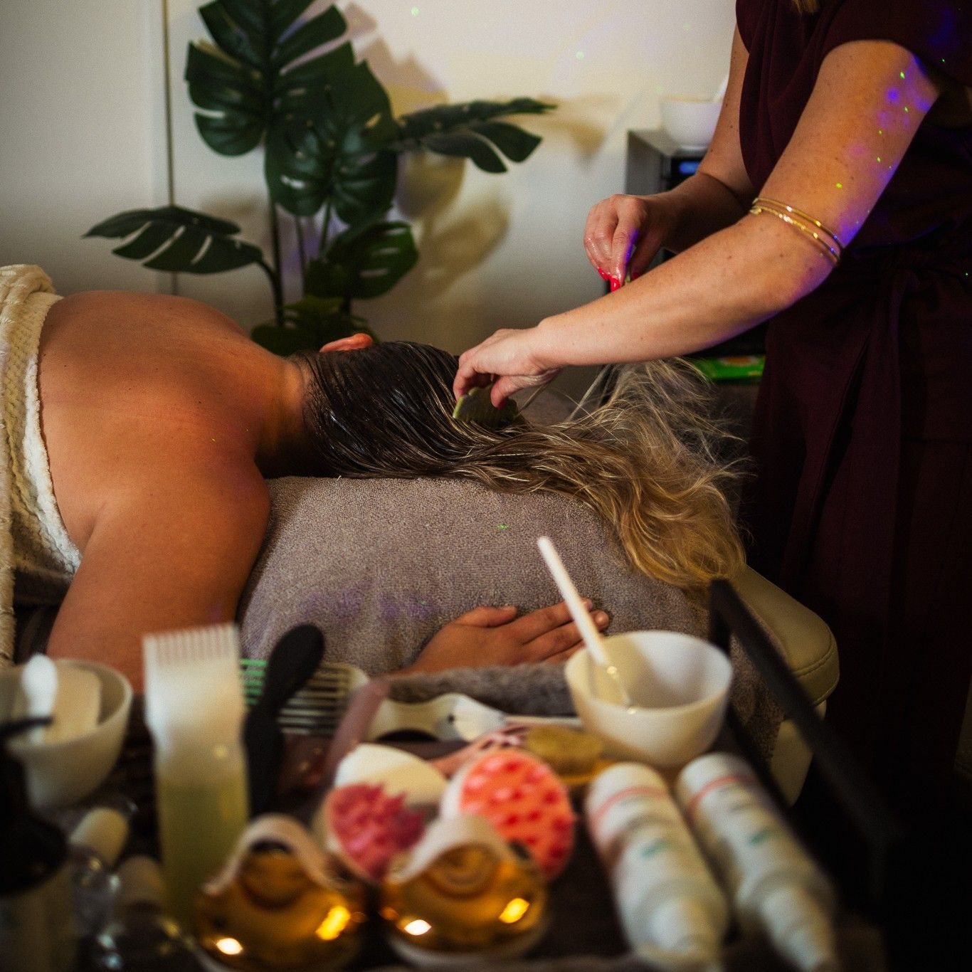 Hair combed out along the treatment bed